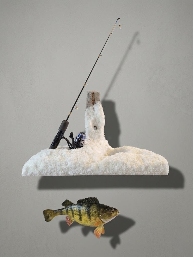 Yellow perch ice fishing diorama with a snowy composition and an ice rod
